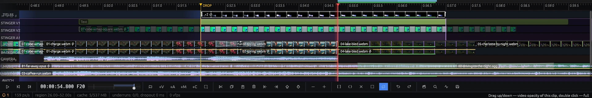 Timeline close-up at the DROP marker: a nested reel opened in place, its own text, video and audio tracks shown between the main tracks with the parts outside the instance veiled on both sides; filmstrips along video clips and waveforms on the audio tracks.
